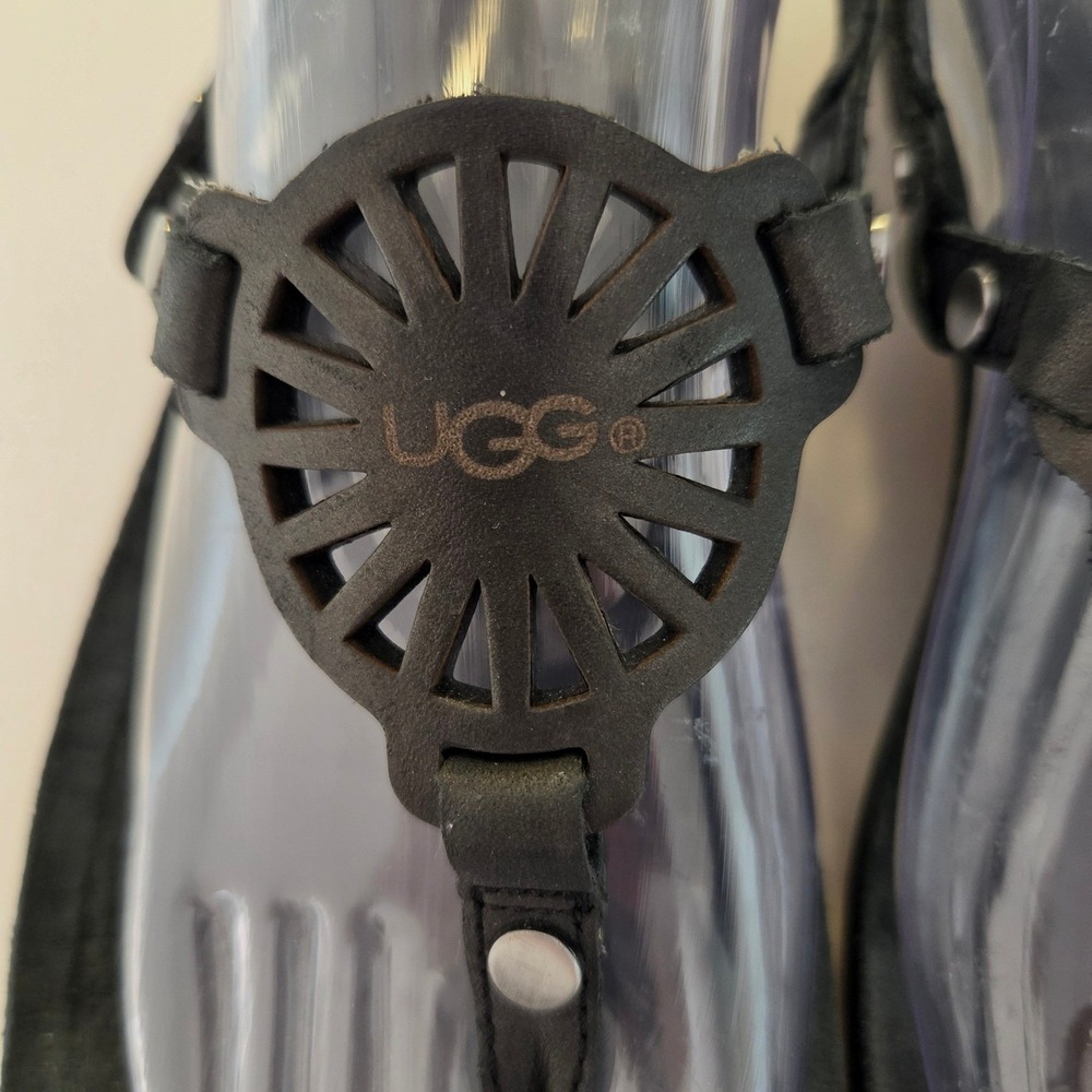 UGG Womens Black Leather T-Strap Medallion Logo Flat Sandals Size 9